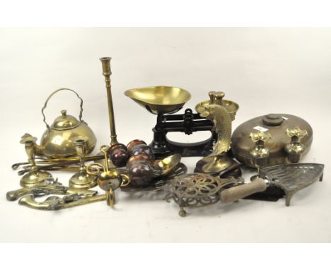 A collection of brass and metalware, including a Librasco set of cast iron and brass scales, candlesticks, trivets, a kettle,