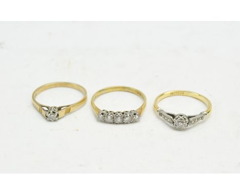 Three 20th century diamond set dress rings, including a 9ct solitaire ring, a yellow metal five stone ring and a 18ct gold an