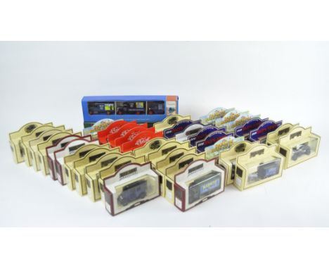 A selection of vintage Lledo and other die cast vehicles, including examples from the 'Days Gone' series, in original boxes