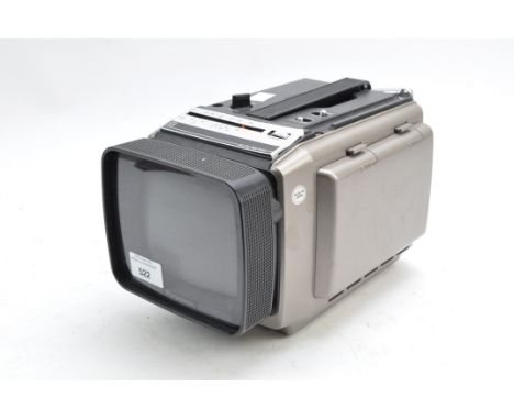 A grey mini Panasonic television, model TR-5030G, DC 9V-5W