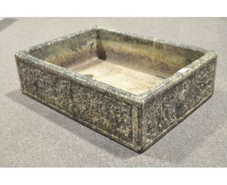 A concrete feeding trough marked Willowstone.  69cm x 51cm x 21cm 