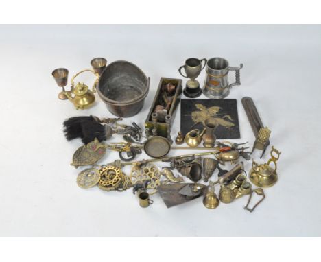 A collection of brassware, to include a door handle, goblets, model animals, brushes and more