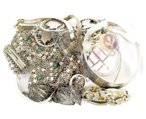 A selection of assorted white metal and silver jewellery, to include a silver bangle, silver necklace, cross pendant on chain