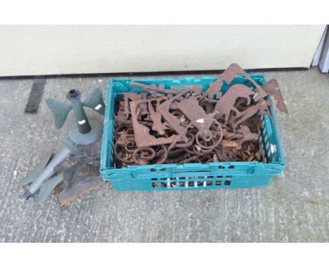 A large collection of cast metal weather vane parts and letters of various designs including one depicting a hunter