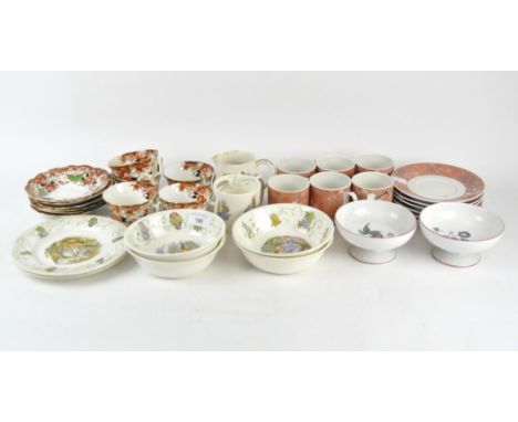 A collection of part tea services, including Wedgwood 'Peter Rabbit' pattern plates, bowls, mug and jug, six Villeroy &amp; B