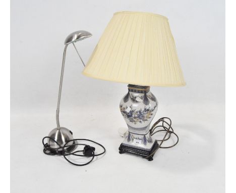 Two table lamps, one a blue and white ceramic lamp with silk shade, height to fitting 37cm, the other a Endon metal adjustabl