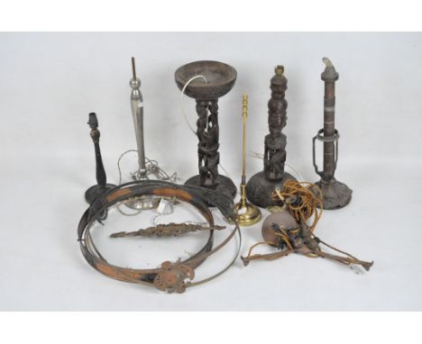 A group of vintage lighting, including a Palmer & Co patent lamp base, an Empire style copper light fittings, various Tribal 