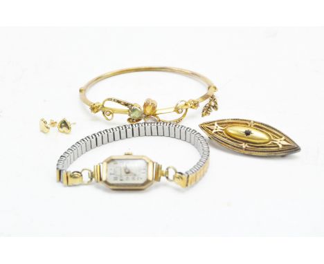 A collection of 9ct gold and yellow metal jewellery, to include a 9ct bangle set with semi-precious stones, a yellow metal ov