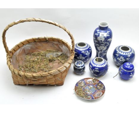 Selection of Chinese porcelain blue and white porcelain ginger jars and vases, all decorated with flowering prunus branches, 