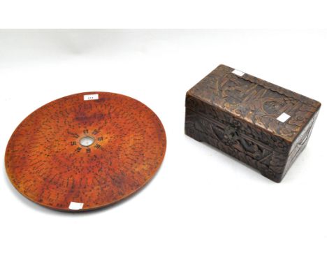 A Chinese tabletop sundial and small camphor wood carved box, the sundial of circular form, 38cm diameter, the storage box wi