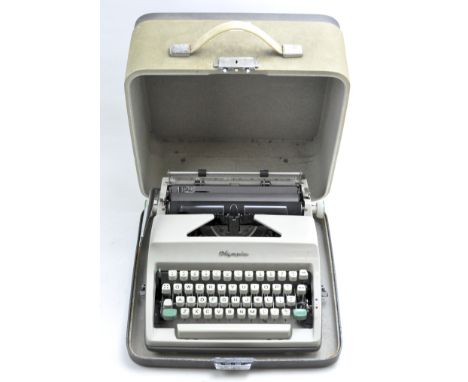 A vintage Olympia typewriter in original carry case