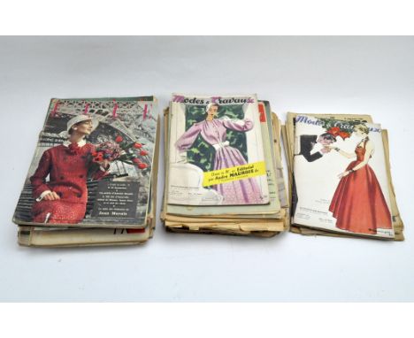 A collection of sixty vintage French Fashion Magazines, mostly dating from the 1940's and 1950's, Condition Report: All have 