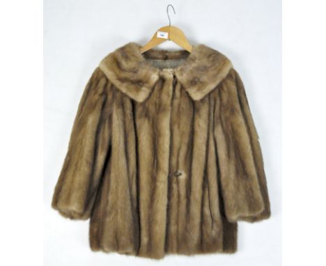 A vintage ladies mink fur coat, with brown silk lining, shoulder width 49cm, length 69cm