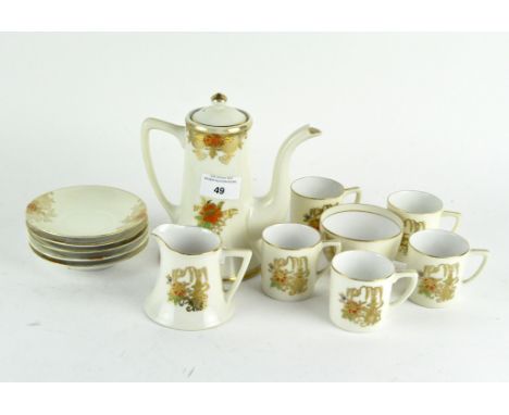 A Japanese Noritake coffee service, 20th century, comprising five cups and saucers, sugar bowl, milk jug and coffee pot, heig