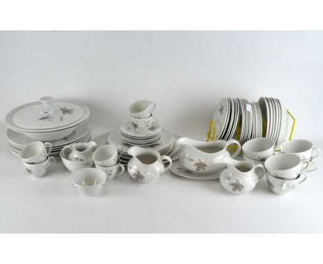 An extensive Royal Doulton 'Tumbling Leaves' tea and dinner service comprising cups and saucers, milk jugs, sauce boat, dishe