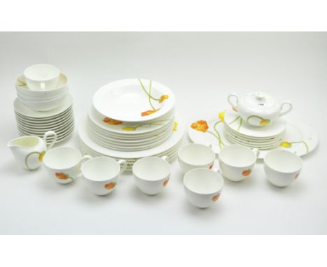 A Villeroy &amp; Boch part tea and dinner service, comprising cups and saucers, a cream jug, sugar bowls, assorted plates and