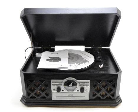 A reproduction Zennox turntable with CD player, cassette player and AM/FM radio player, 46cm wide