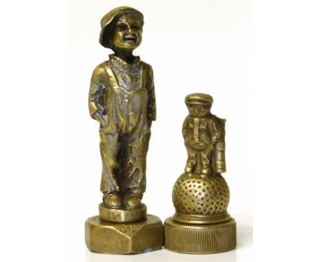 Two brass car mascots "Dunlop" and "The Kid". Condition reports are not availabe for our Interiors Sales.