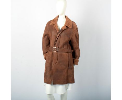 Size 50. Handcrafted genuine leather brown coat, with a leather belt.By BrioniÂ&nbsp;forÂ&nbsp;Neiman Marcus stitched patch i