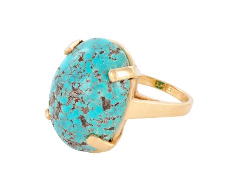 An absolutely stunning mid century modern ladies ring with a large oval dome shaped turquoise stone. Weight 13.2 grams. Size 