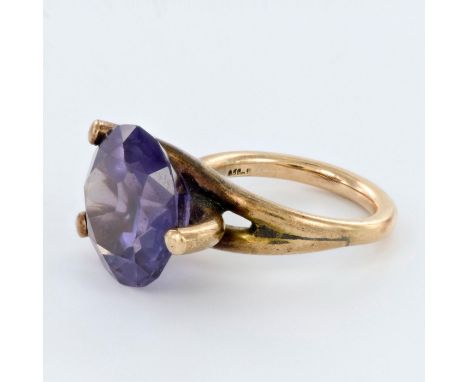 An eye catching Art Deco design ladies ring with a large round sapphire measuring 14mm. Weight 8.5 grams. Size 5.5. Condition