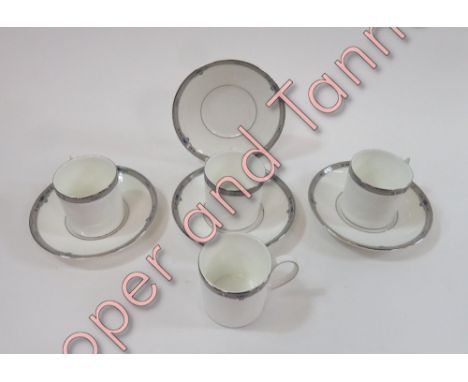 A set of four Wedgwood matching cup and saucers in the Amherst" patten"