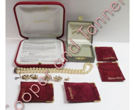 A uniform row of simulated pearls to a silver gilt catch, cased; and other simulated pearl items