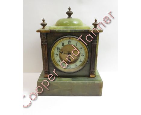 A French alabaster 8 day mantel clock, non striking with pendulum but no key