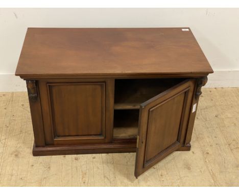 A Victorian mahogany two-door cupboard, with single shelf, (formerly from of larger piece of furniture) H56cm W92cm, D48cm