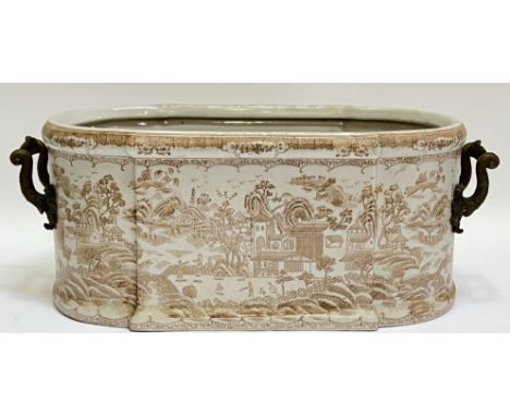 A Victorian style ceramic planter with chinoiserie decoration and twin floral cast brass handles (h- 22cm, w- 56cm)