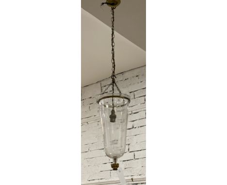 A 20th century brass mounted pendent lantern style light fitting with glass shade. Height of fitting 43cm, W15cm.&nbsp;