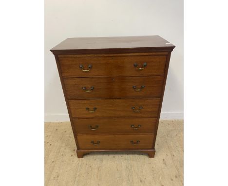 An Edwardian mahogany chest fitted with five drawers, raised on bracket supports.H133cm, W95cm, D50cm.&nbsp;