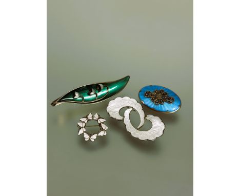 A group of four silver brooches to include a Danish white enamel circular butterfly brooch no signs of damage to enamel D x 3