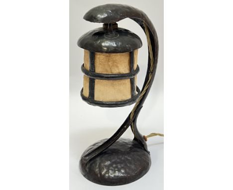An American Arts and Crafts/Mission style planished copper table lamp in the form of a lantern with hessian shade (h- 29cm)