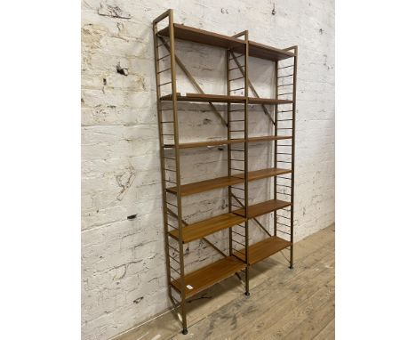 Staples Ladderax, a mid century two bay modular wall shelf, fitted with twelve teak veneered shelves. H200cm, W125cm, D22cm.&