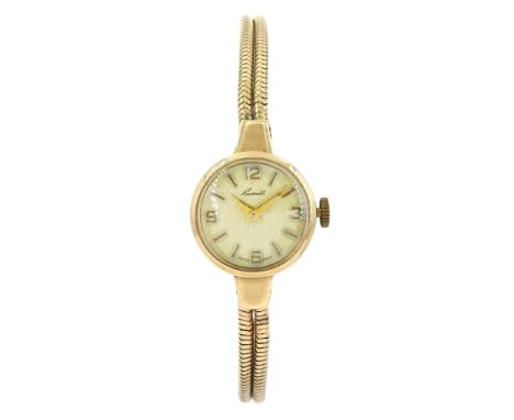 Russell ladies 9ct gold manual wind wristwatch, on 9ct gold snake link bracelet, hallmarkedCondition Report:Approx 11.4gm (ex