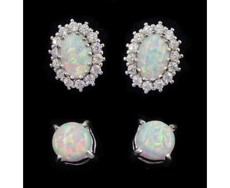 Pair of silver opal and cubic zirconia stud earrings and one other pair of opal stud earrings