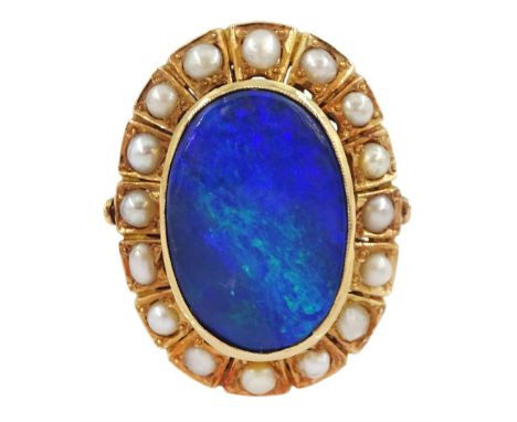 19ct gold black opal doublet and split pearl cluster ringCondition Report:Approx 9.4gm, tested 19ct, size N, overall head = 2