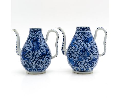 Decorated with sea creatures, floral decor on handle, Kangxi mark, 20 cm. tall. 