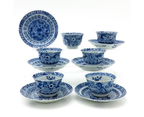 Decorated with florals and sea creatures, mark with double ring and Kangxi mark, saucers are 13 cm. in diameter, some with ch