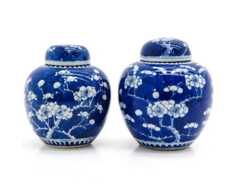 Dark blue ground with white floral blossom decor, Kangxi mark, 16 cm. tall. 