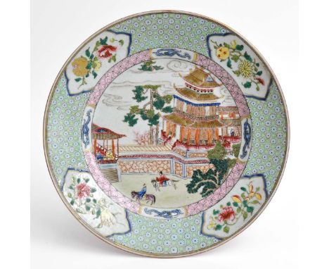 Decorated with pagodas and Chinese figures on horseback, ruby back, 23 cm. in diameter. 