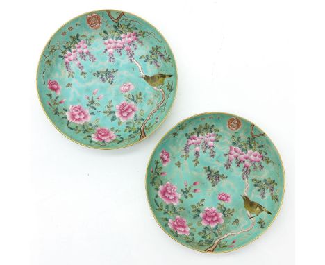 Light green ground with Famille Rose enamels depicting birds and flowers, marked with 4 Chinese characters on bottom, 17 cm. 
