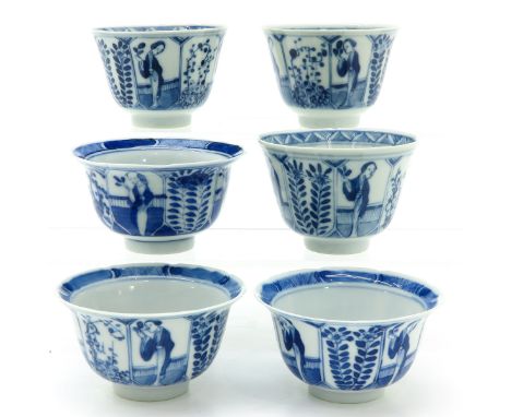 Decorated with scene of Chinese figures and florals, Kangxi mark, 9 cm. in diameter, some with chip and hairline.