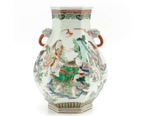 Six sides decorated with Chinese figures, temple lion head handles, Kangxi mark, 42 cm. tall. 