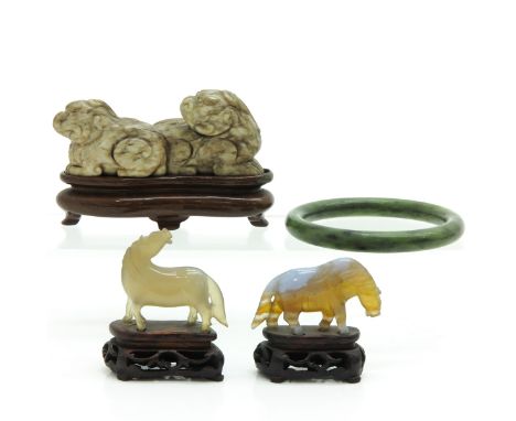 Including three sculptures and a jade bracelet, longest sculpture is 10 cm.