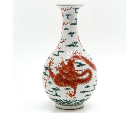Dragon and cloud decor in orange and green enamels, Kangxi mark, 42 cm. tall. 