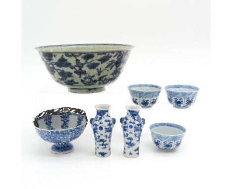Including Kangxi bowl with silver handle, three small bowls, pair of vases and a stoneware bowl, some with chip and hairline.