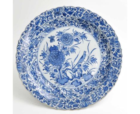 Floral decor with birds, Kangxi period, marked with double ring and Lozenge, approximately 38 cm. in diameter, a few small ch