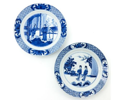 Decorated with Chinese figures, with Chenghua and Kangxi marks, 20 cm. in diameter, with small chips on edge and hairline.